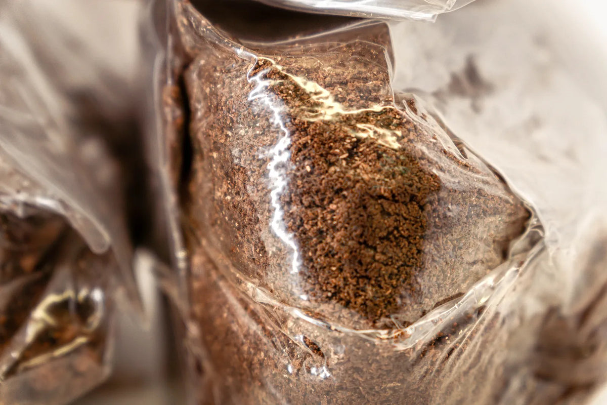 Close-up of hardwood and wheat bran substrate in the bag