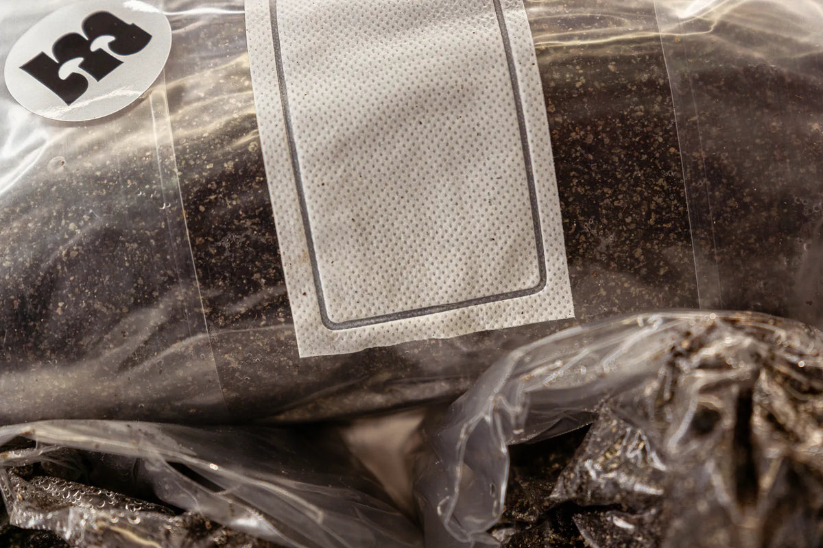 Filter patch and Meisterpilze sticker on a Master's Mix bag
